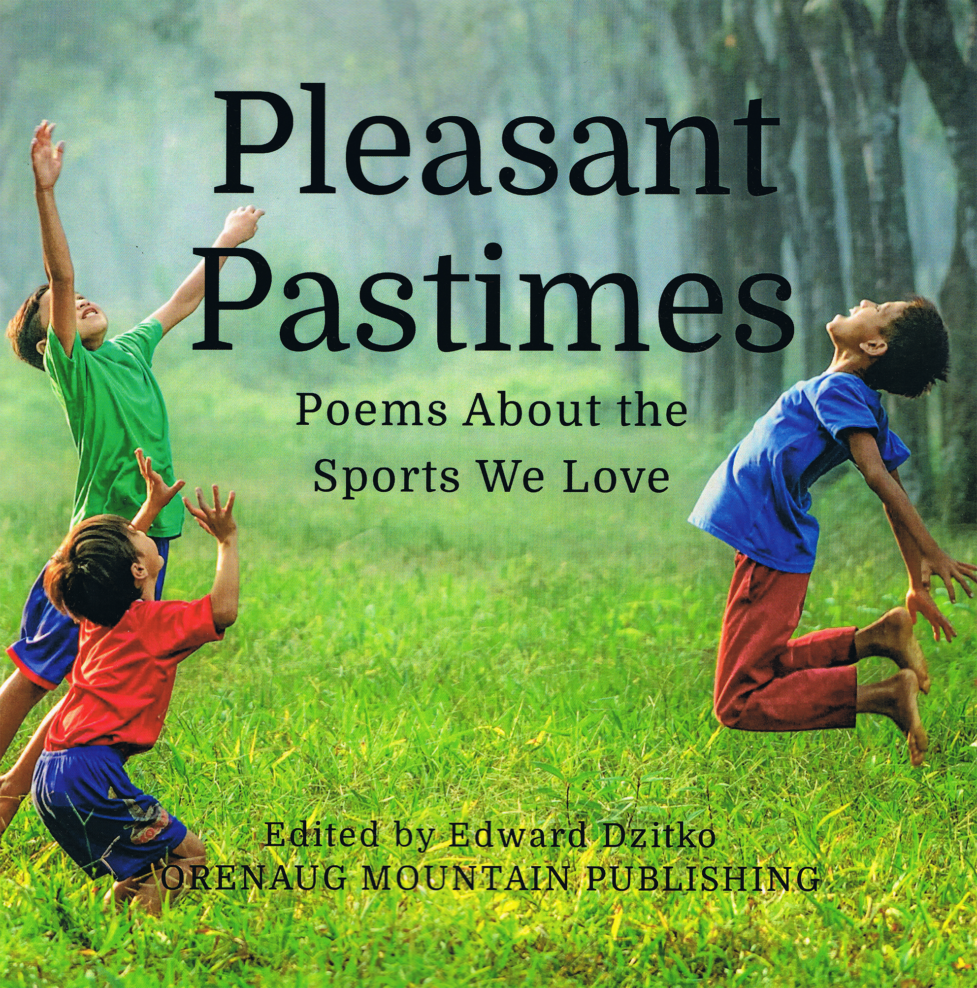 Children jumping on grass, trees in the background, joy.